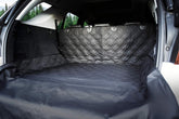 Pawlio™ Heavy-Duty SUV cargo liner and waterproof dog trunk cover showing a durable, waterproof fabric protecting vehicle cargo area