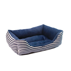 Comfortable vintage-style dog lounge bed by Pawlio featuring soft fabric and cozy design for small to medium dogs.