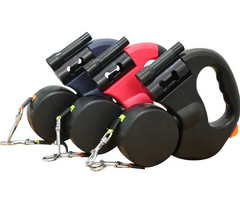Pawlio Auto Double Dog Leash with adjustable straps and durable materials, designed to walk two dogs comfortably side by side.