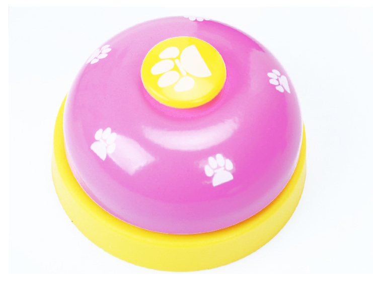 Pawlio Paw Press Training Bell with a metal bell and a colorful paw print design for dog training and communication.