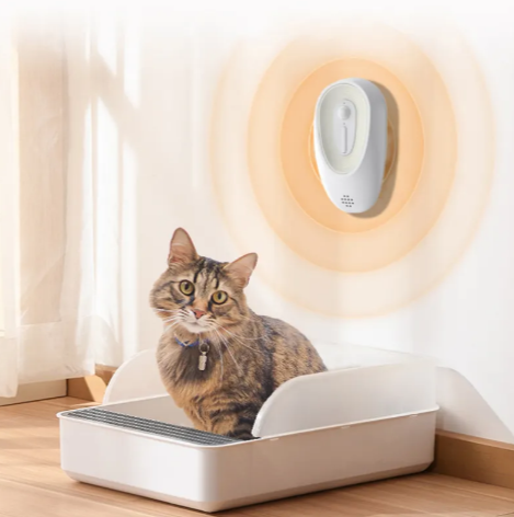 Pawlio Pet Odor Eliminator for litter boxes, featuring a spray bottle and fresh scent, designed to neutralize odors effectively.