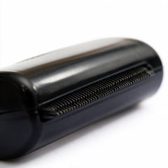 Pawlio pet grooming comb with fine and coarse teeth for detangling and brushing cats and dogs' fur.