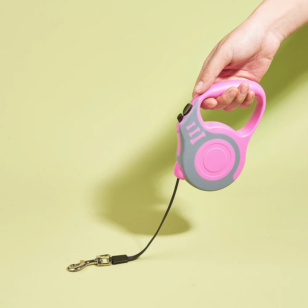 Pawlio™ Automatic Retractable Dog Leash with 3m and 5m durable nylon lead, featuring a handle and locking mechanism for control.