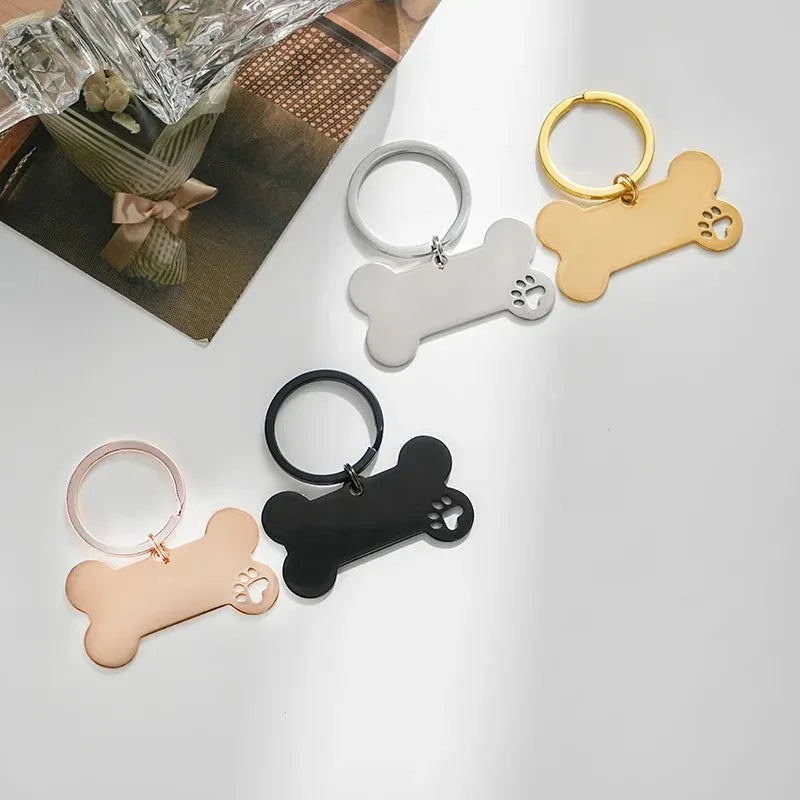 Bone-shaped engraved pet ID tag from Pawlio with name and phone number for dogs and cats, high quality personalized pet pendant.