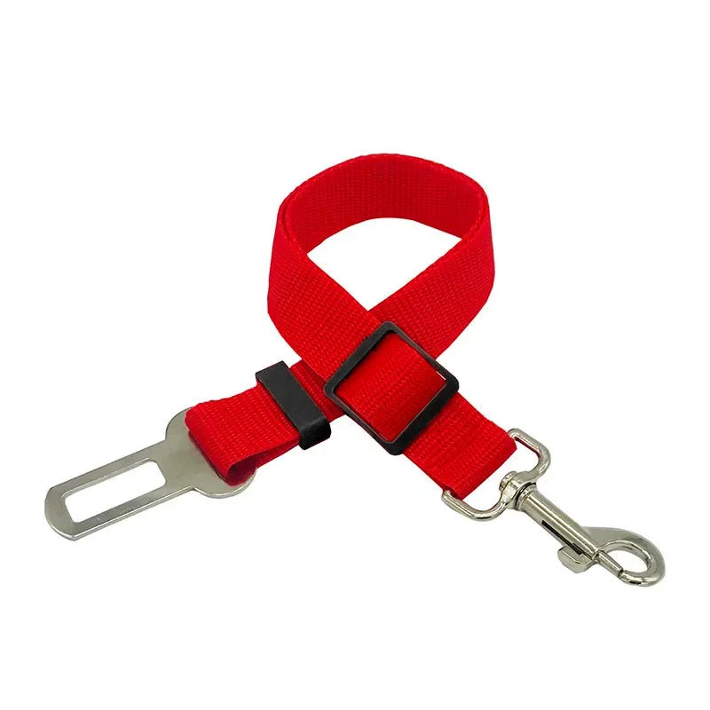 Pawlio™ adjustable dog car seat belt and safety harness attached to a dog sitting in a car seat, ensuring secure travel.