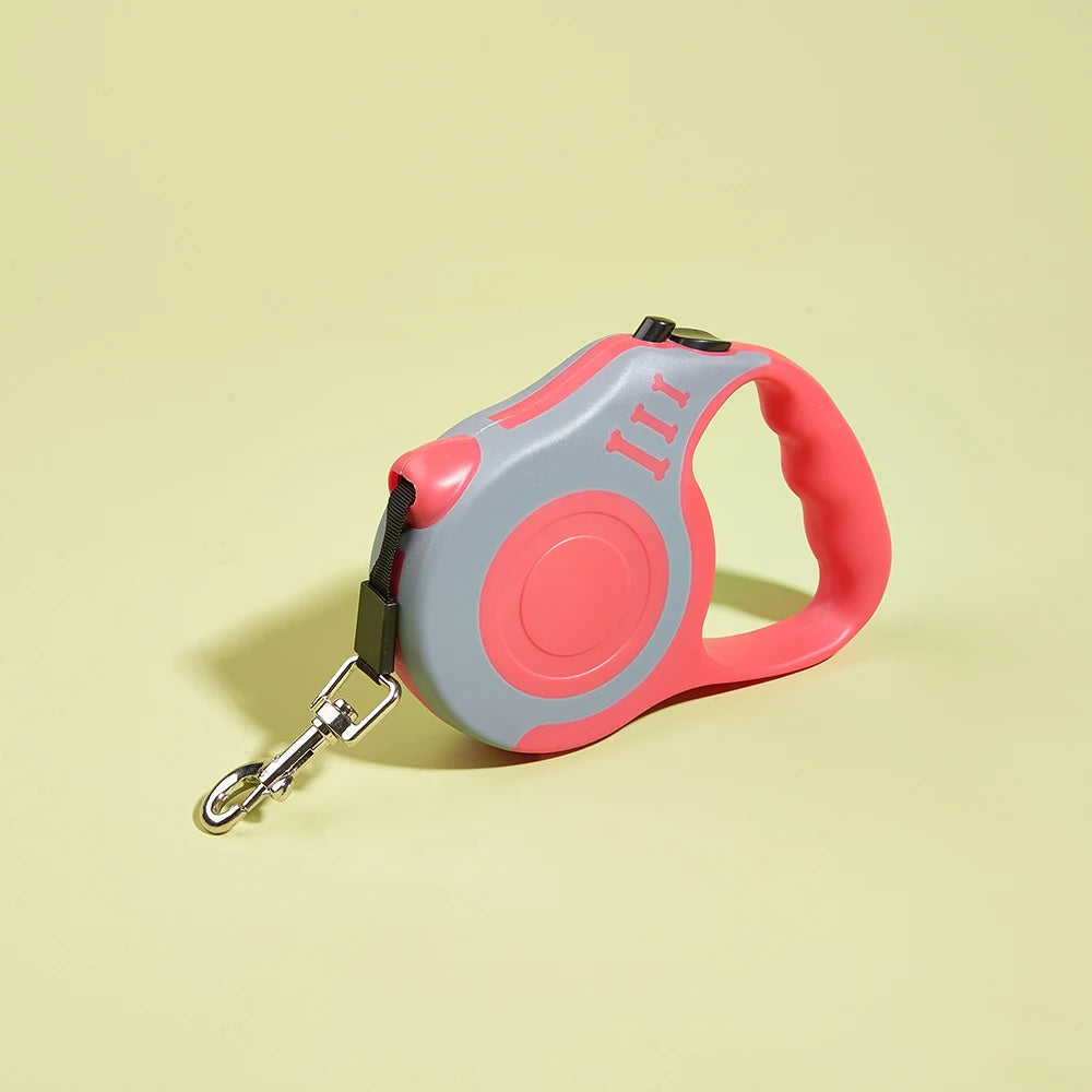 Pawlio™ automatic retractable dog leash with a 3m or 5m durable nylon lead, featuring a comfortable handle for easy control.