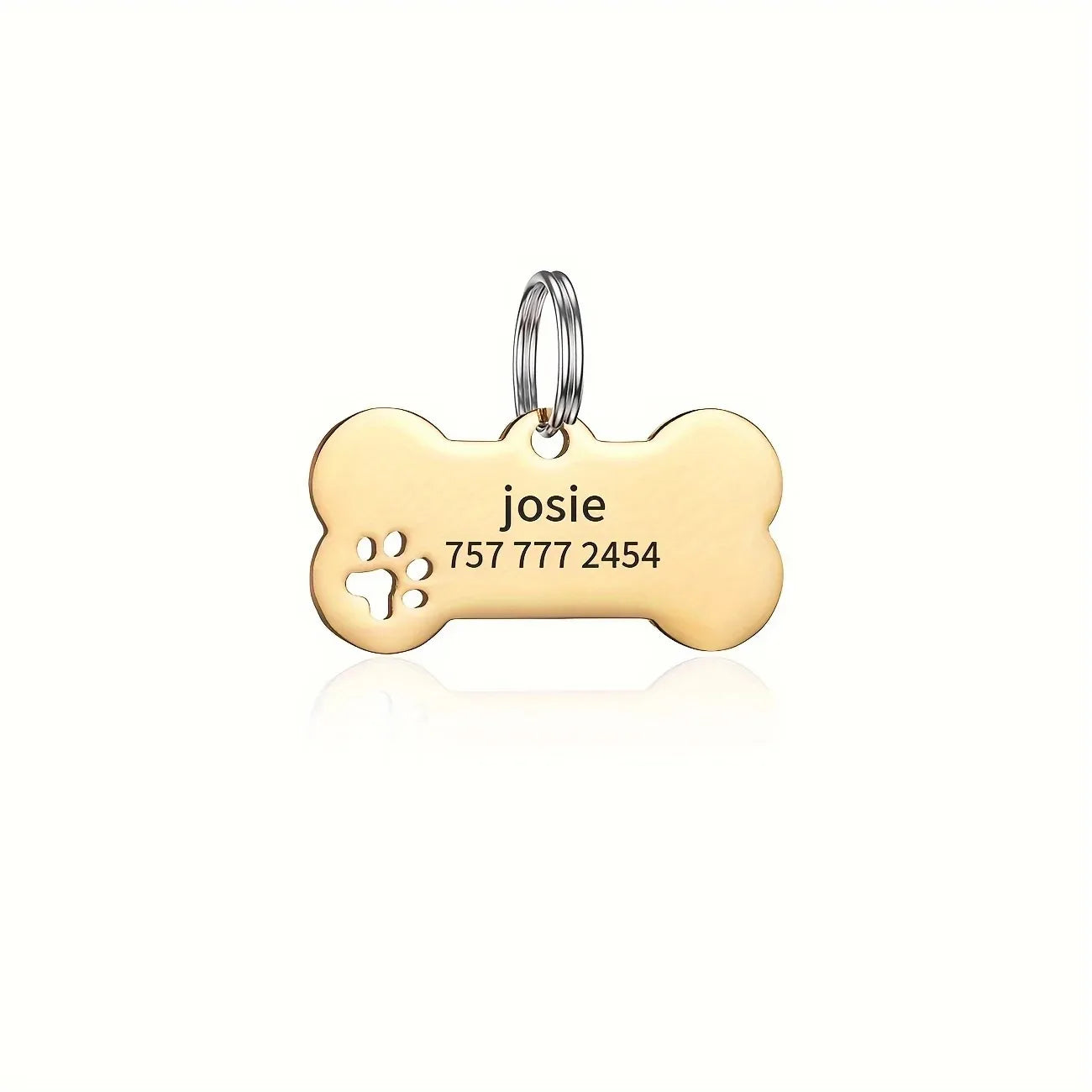 Bone-shaped engraved pet tag for dog or cat from Pawlio, featuring space for name and phone number on a high-quality metal pendant.