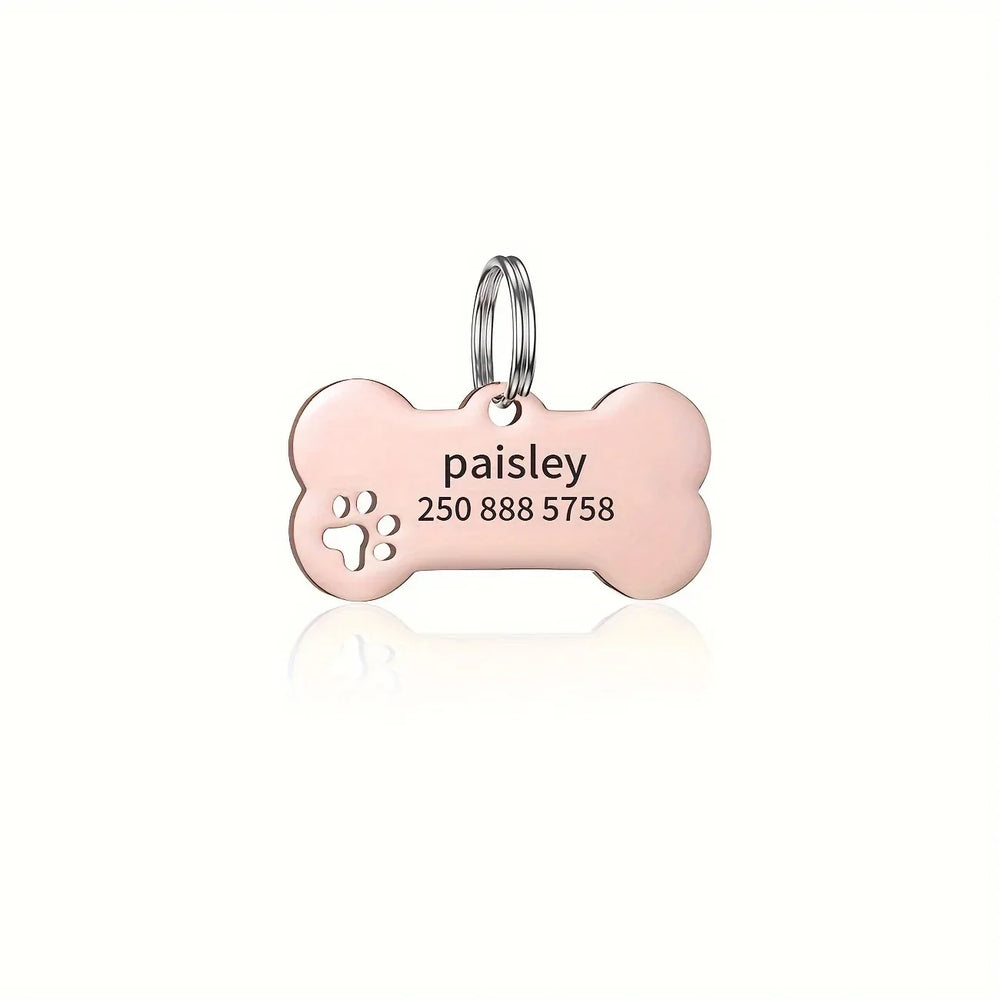 Personalized Pawlio bone-shaped dog and cat ID tags with engraved name and phone number for custom pet identification.