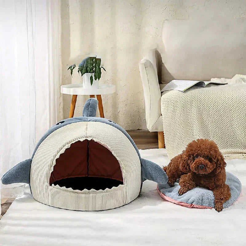 Luxurious plush shark pet bed by Pawlio™ with cozy cave design for dogs and cats, providing comfort and warmth.