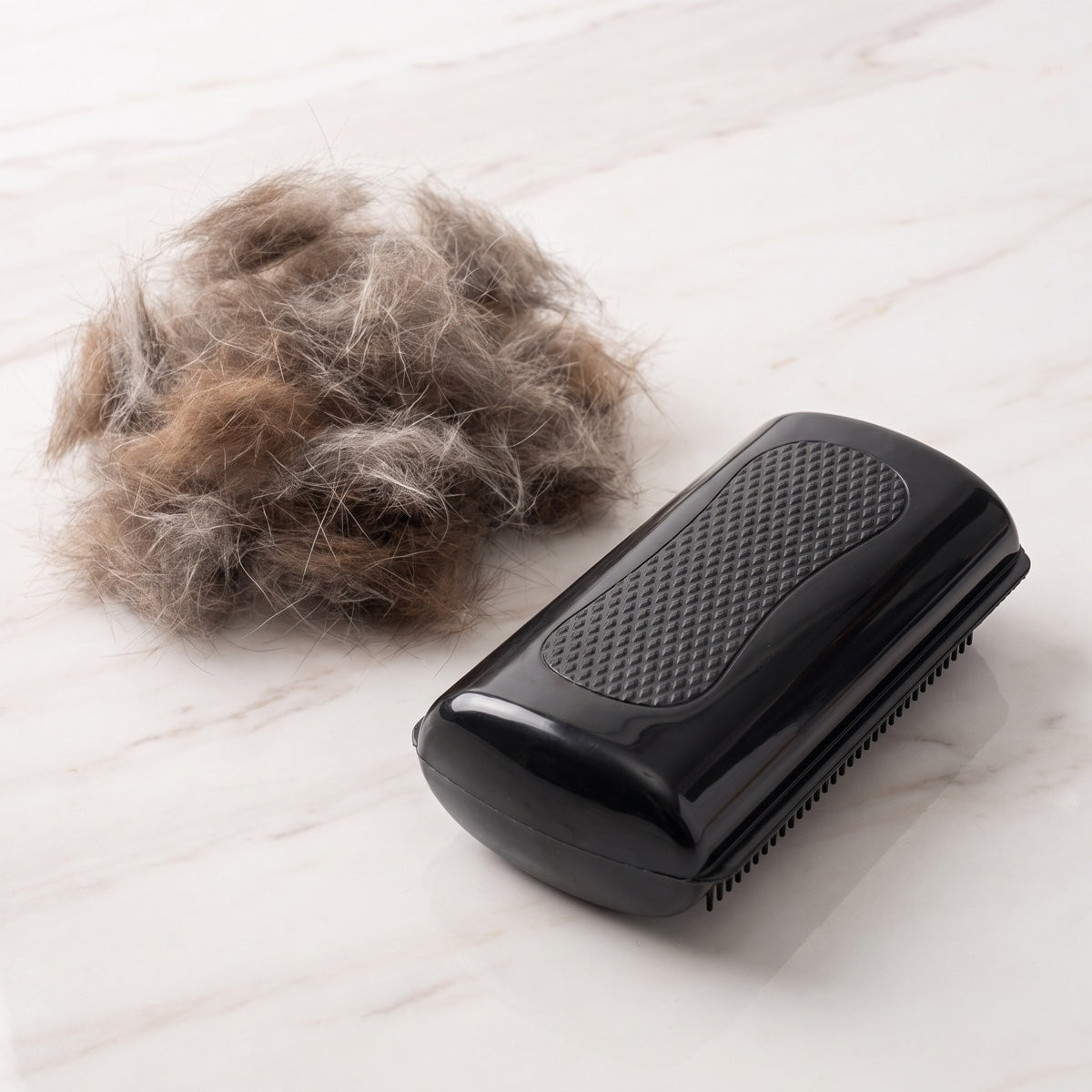 Pet grooming comb by Pawlio with wide and fine teeth for detangling and grooming dogs and cats effectively.